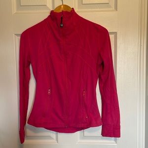 LuLulemon Zip Up sweater. Pink in color. Size 6.